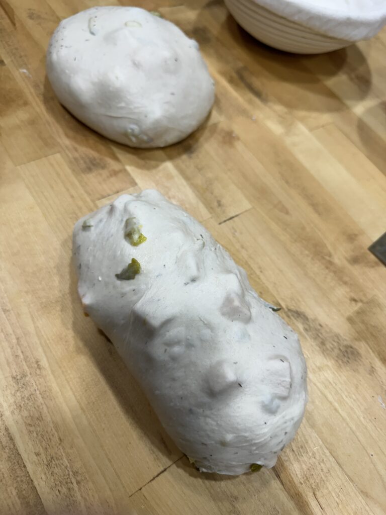 Finished dough, ready for cold proofing. Dill Pickle Cheddar Sourdough