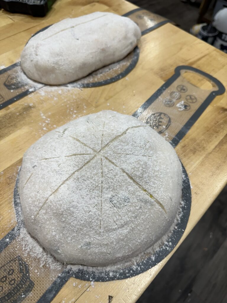 Use a lame, sharp knife or razor to score across your sourdough.